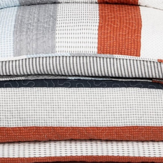 Clément striped quilt